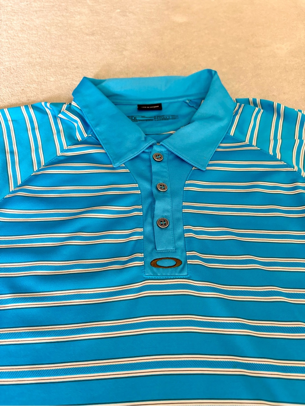 Oakley “Kapolei” Aqua Polo with Multicolor Stripe Detail